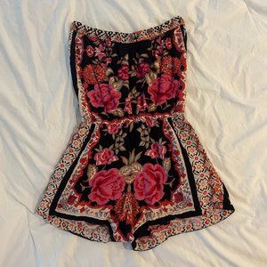 Angie size M floral strapless romper with waist tie.